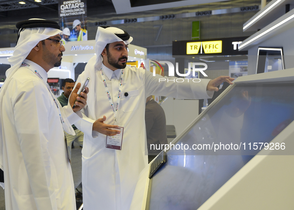 People visit the ConteQ Expo24 (Advanced Technology for Construction & Services Expo) at the Qatar National Convention Centre (QNCC) in Doha...