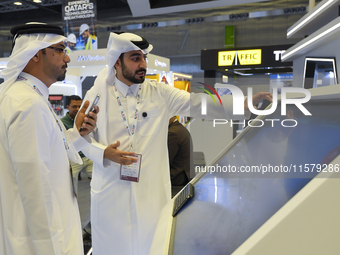 People visit the ConteQ Expo24 (Advanced Technology for Construction & Services Expo) at the Qatar National Convention Centre (QNCC) in Doha...