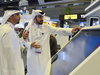 People visit the ConteQ Expo24 (Advanced Technology for Construction & Services Expo) at the Qatar National Convention Centre (QNCC) in Doha...