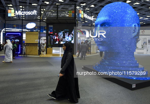 People visit the Microsoft booth during ConteQ Expo24 (Advanced Technology for Construction & Services Expo) at the Qatar National Conventio...