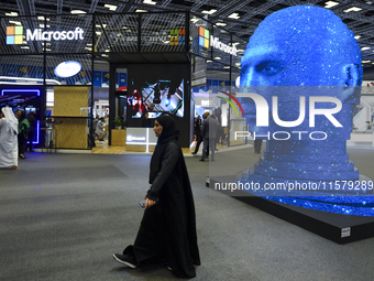 People visit the Microsoft booth during ConteQ Expo24 (Advanced Technology for Construction & Services Expo) at the Qatar National Conventio...