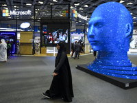 People visit the Microsoft booth during ConteQ Expo24 (Advanced Technology for Construction & Services Expo) at the Qatar National Conventio...