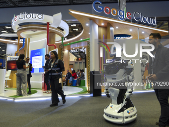 People visit the Google Cloud booth during ConteQ Expo24 (Advanced Technology for Construction & Services Expo) at the Qatar National Conven...