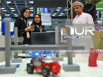 People visit 3D construction printing technology at the ConteQ Expo24 (Advanced Technology for Construction & Services Expo) at the Qatar Na...