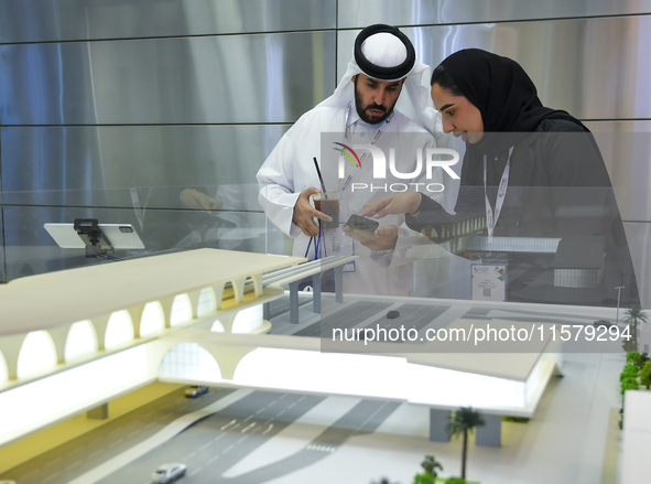 People visit the Qatar Rail booth during ConteQ Expo24 (Advanced Technology for Construction & Services Expo) at the Qatar National Conventi...