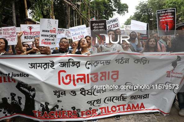 Teachers shout slogans during a protest rally against the rape and murder of a PGT woman doctor at the government-run R G Kar Medical Colleg...