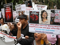 Teachers shout slogans during a protest rally against the rape and murder of a PGT woman doctor at the government-run R G Kar Medical Colleg...