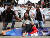 Artists perform a street play during a teachers' protest against the rape and murder of a PGT woman doctor at the government-run R G Kar Med...