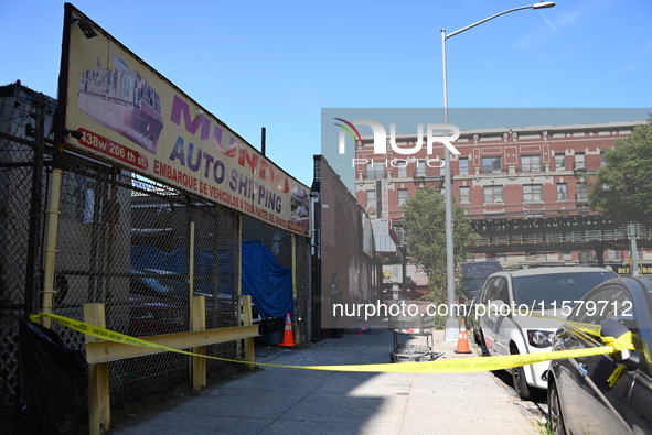 NYPD crime scene investigators search for evidence where a 32-year-old man is shot numerous times and killed in Manhattan, New York, United...