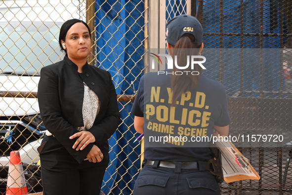 NYPD crime scene investigators search for evidence where a 32-year-old man is shot numerous times and killed in Manhattan, New York, United...