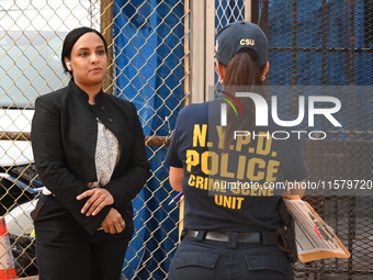 NYPD crime scene investigators search for evidence where a 32-year-old man is shot numerous times and killed in Manhattan, New York, United...