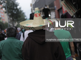 A person wears a charro hat at Zocalo in the main square to celebrate the 214th Anniversary of Mexico's Independence Day on September 15, 20...