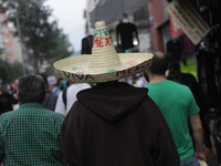 A person wears a charro hat at Zocalo in the main square to celebrate the 214th Anniversary of Mexico's Independence Day on September 15, 20...