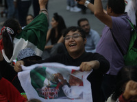 Hundreds of people attend the Zocalo in the main square to listen to Mexican President Lopez Obrador shout the 214th Anniversary of Mexico's...