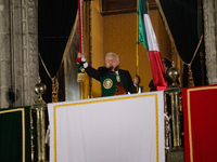 Mexico's President, Andres Manuel Lopez Obrador, waves the Mexican flag and makes his last shout of independence to commemorate the 214th an...