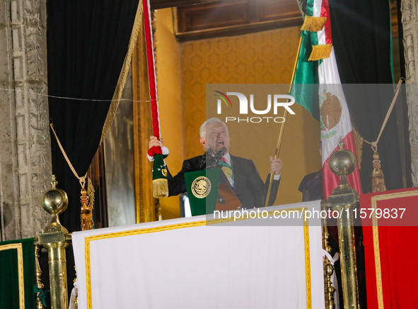 Mexico's President, Andres Manuel Lopez Obrador, waves the Mexican flag and makes his last shout of independence to commemorate the 214th an...