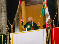 Mexico's President, Andres Manuel Lopez Obrador, waves the Mexican flag and makes his last shout of independence to commemorate the 214th an...