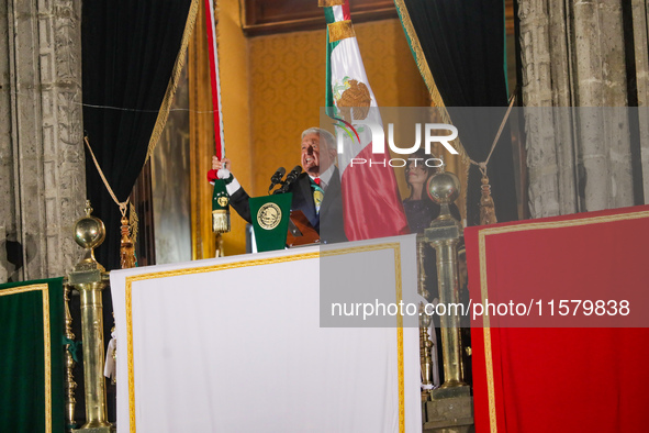 Mexico's President, Andres Manuel Lopez Obrador, waves the Mexican flag and makes his last shout of independence to commemorate the 214th an...