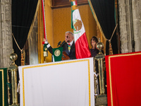 Mexico's President, Andres Manuel Lopez Obrador, waves the Mexican flag and makes his last shout of independence to commemorate the 214th an...