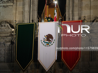 Mexico's President, Andres Manuel Lopez Obrador, waves the Mexican flag and makes his last shout of independence to commemorate the 214th an...