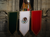 Mexico's President, Andres Manuel Lopez Obrador, waves the Mexican flag and makes his last shout of independence to commemorate the 214th an...