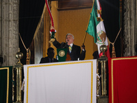 Mexico's President, Andres Manuel Lopez Obrador, waves the Mexican flag and makes his last shout of independence to commemorate the 214th an...