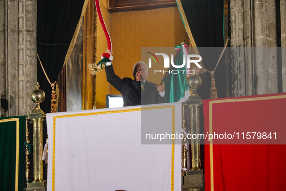 Mexico's President, Andres Manuel Lopez Obrador, waves the Mexican flag and makes his last shout of independence to commemorate the 214th an...