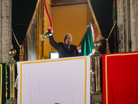 Mexico's President, Andres Manuel Lopez Obrador, waves the Mexican flag and makes his last shout of independence to commemorate the 214th an...