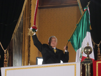 Mexico's President, Andres Manuel Lopez Obrador, waves the Mexican flag and makes his last shout of independence to commemorate the 214th an...