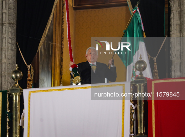 Mexico's President, Andres Manuel Lopez Obrador, waves the Mexican flag and makes his last shout of independence to commemorate the 214th an...