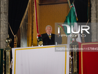 Mexico's President, Andres Manuel Lopez Obrador, waves the Mexican flag and makes his last shout of independence to commemorate the 214th an...