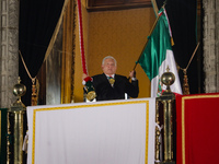 Mexico's President, Andres Manuel Lopez Obrador, waves the Mexican flag and makes his last shout of independence to commemorate the 214th an...