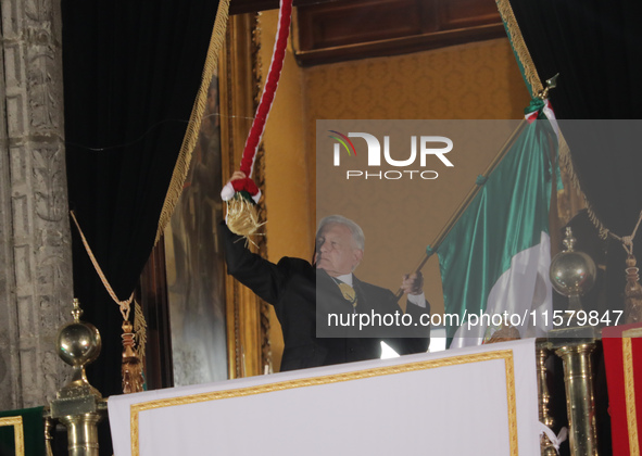 Mexico's President, Andres Manuel Lopez Obrador, waves the Mexican flag and makes his last shout of independence to commemorate the 214th an...