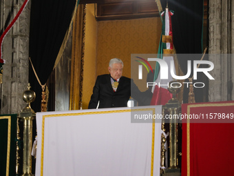 Mexico's President, Andres Manuel Lopez Obrador, waves the Mexican flag and makes his last shout of independence to commemorate the 214th an...