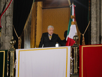 Mexico's President, Andres Manuel Lopez Obrador, waves the Mexican flag and makes his last shout of independence to commemorate the 214th an...