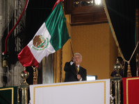 Mexico's President, Andres Manuel Lopez Obrador, waves the Mexican flag and makes his last shout of independence to commemorate the 214th an...