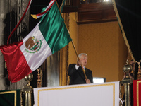 Mexico's President, Andres Manuel Lopez Obrador, waves the Mexican flag and makes his last shout of independence to commemorate the 214th an...