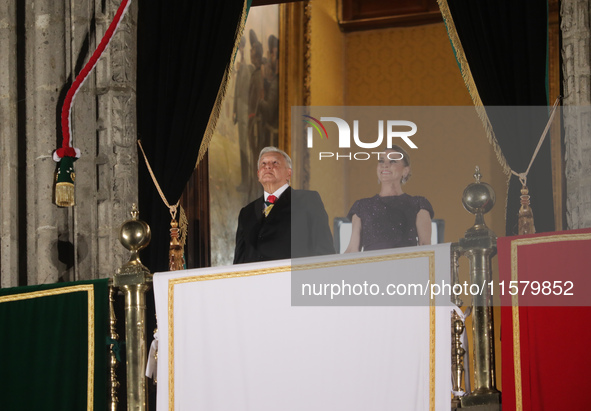 Mexico's President, Andres Manuel Lopez Obrador, accompanied by his wife Beatriz Gutierrez Muller, makes his last shout of independence to c...