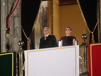 Mexico's President, Andres Manuel Lopez Obrador, accompanied by his wife Beatriz Gutierrez Muller, makes his last shout of independence to c...