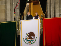 Mexico's President, Andres Manuel Lopez Obrador, accompanied by his wife Beatriz Gutierrez Muller, makes his last shout of independence to c...