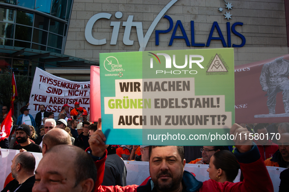 IGM labor union calls for thousands of steel workers to protest in front of Mercatorhall during the national steel summit in Duisburg, Germa...