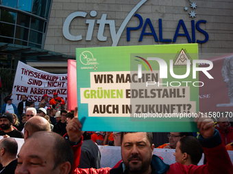 IGM labor union calls for thousands of steel workers to protest in front of Mercatorhall during the national steel summit in Duisburg, Germa...