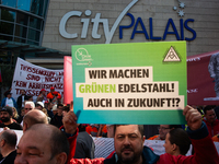 IGM labor union calls for thousands of steel workers to protest in front of Mercatorhall during the national steel summit in Duisburg, Germa...