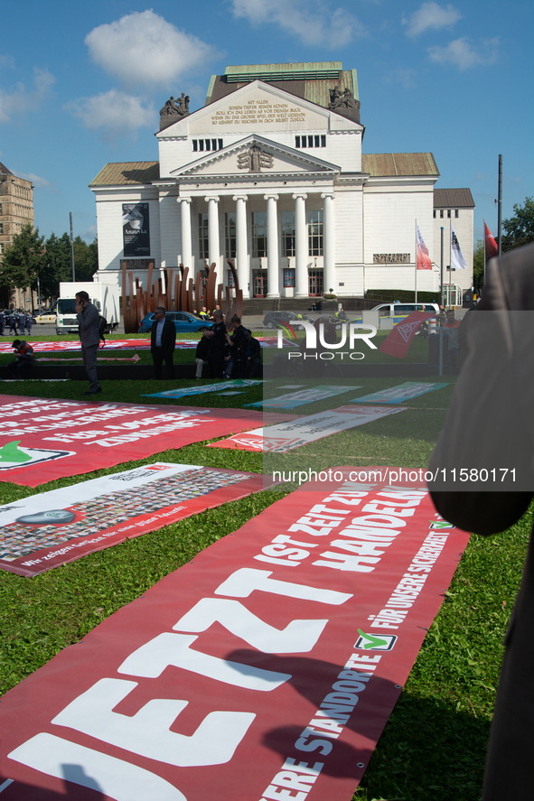 IGM labor union calls for thousands of steel workers to protest in front of Mercatorhall during the national steel summit in Duisburg, Germa...