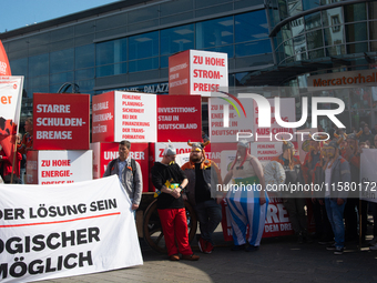 IGM labor union calls for thousands of steel workers to protest in front of Mercatorhall during the national steel summit in Duisburg, Germa...