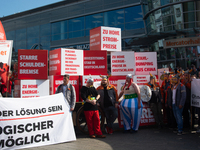 IGM labor union calls for thousands of steel workers to protest in front of Mercatorhall during the national steel summit in Duisburg, Germa...