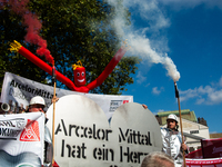 IGM labor union calls for thousands of steel workers to protest in front of Mercatorhall during the national steel summit in Duisburg, Germa...