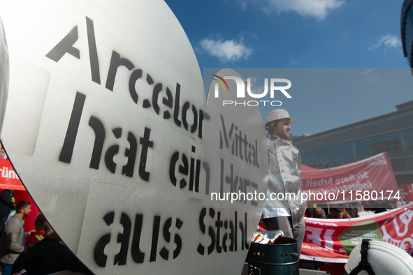 IGM labor union calls for thousands of steel workers to protest in front of Mercatorhall during the national steel summit in Duisburg, Germa...