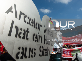 IGM labor union calls for thousands of steel workers to protest in front of Mercatorhall during the national steel summit in Duisburg, Germa...