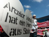 IGM labor union calls for thousands of steel workers to protest in front of Mercatorhall during the national steel summit in Duisburg, Germa...